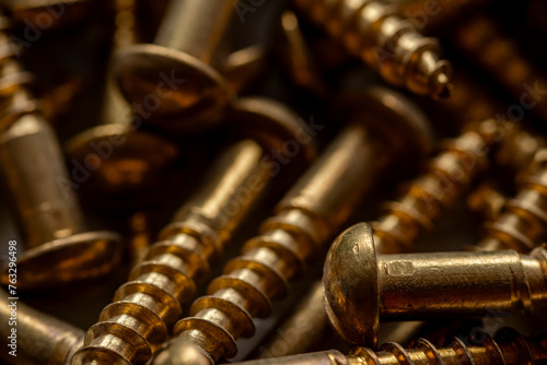 close up of many brass colored screws