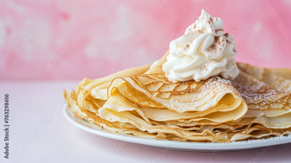 closeup shot of a plate of crepes pancake topped with whipped cream, a delicious French cuisine made with basic ingredients like flour, eggs, and milk, and often sprinkled with powdered sugar closeup shot of a plate of crepes pancake topped with whipped cream, a delicious French cuisine made with basic ingredients like flour, eggs, and milk, and often sprinkled with powdered sugar