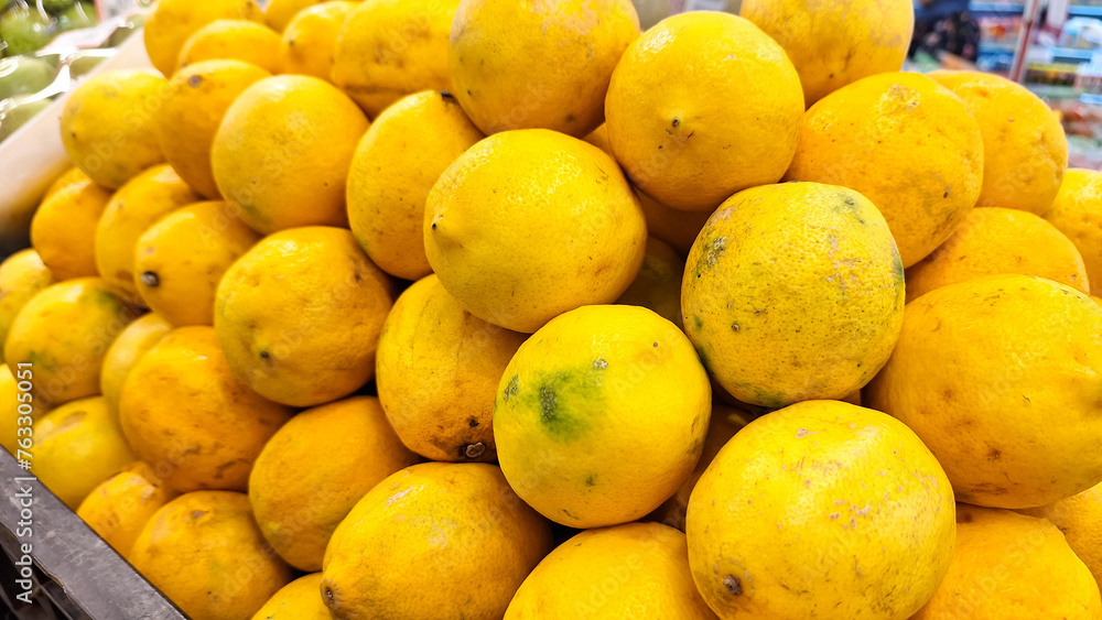 Lemons or Citrus lemons are sold and displayed in supermarkets.