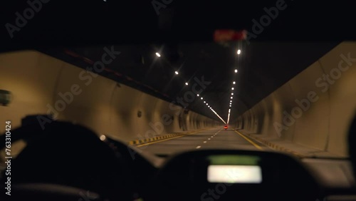 Car driving in a tunnel