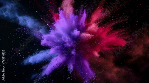 Explosion of colored powder  isolated on black background. Abstract colored background