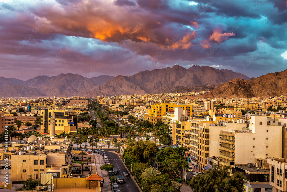 Beautiful sunset cloudy sky over Aqaba city. Jordan