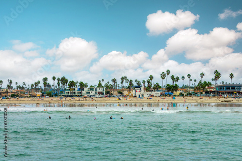 Fototapeta Naklejka Na Ścianę i Meble -  Surfers at Ocean beach in San Diego, Californnia