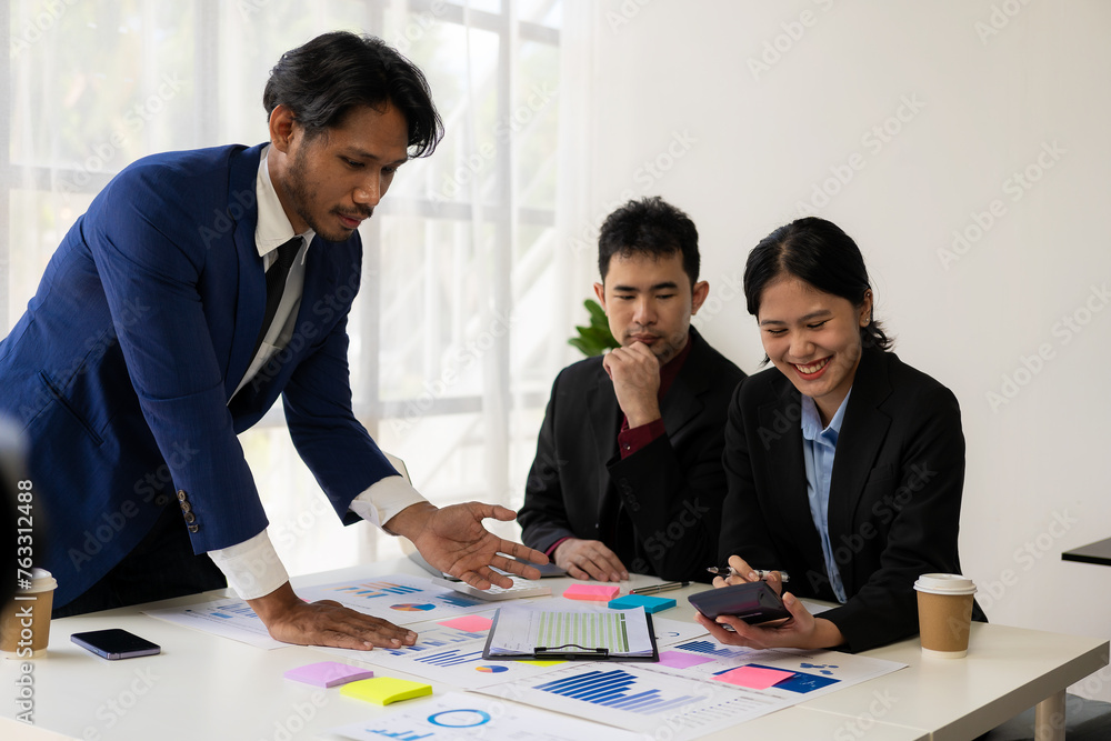 Successful people of various nationalities, creative business team presenting discuss ideas Brainstorm ideas, work as a team, have a meeting atmosphere with smiles at the conference room. Successful people of various nationalities, creative business team presenting discuss ideas Brainstorm ideas, work as a team, have a meeting atmosphere with smiles at the conference room.