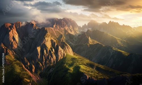light and shadow on the rocky slopes of mountains at sunrise 