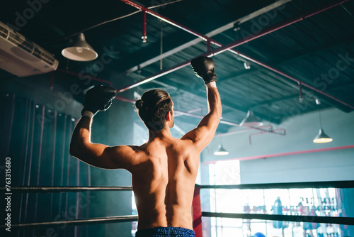 Gym atmosphere, Two professional fighters posing on the sport boxing ring. Fit muscular caucasian athletes or boxers fighting, Sport competition and human emotions concept, MMA or Thai Boxing match