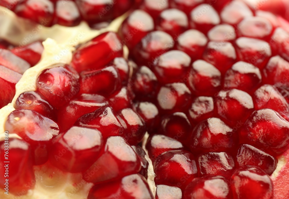 Ripe juicy pomegranate grains as background, closeup Ripe juicy pomegranate grains as background, closeup