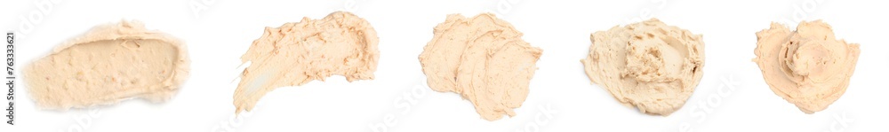 Tasty nut butter isolated on white, top view Tasty nut butter isolated on white, top view