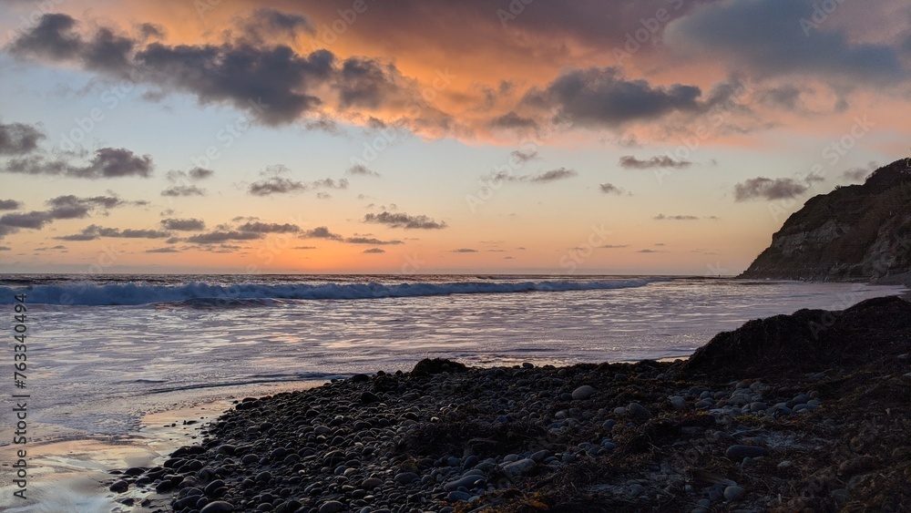 Southern California beach scenes with sunsets, surfers, tide pools and palms trees at Swamis Reef Surf Park and Moonlight Beach in Encinitas California.