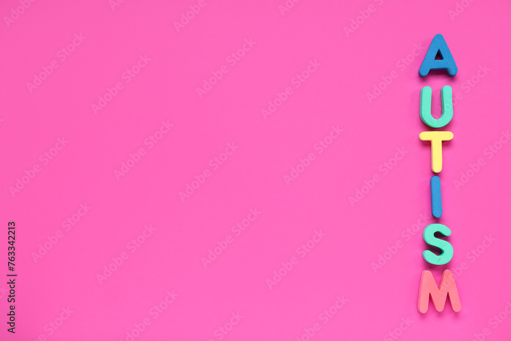Word AUTISM on pink background. Autism disorder concept Word AUTISM on pink background. Autism disorder concept