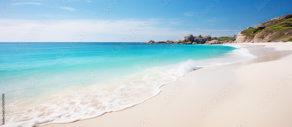Beautiful beach with white sand and clear blue waters