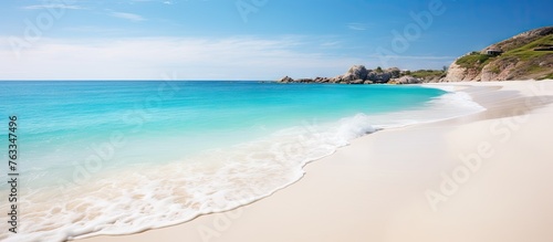 Beautiful beach with white sand and clear blue waters