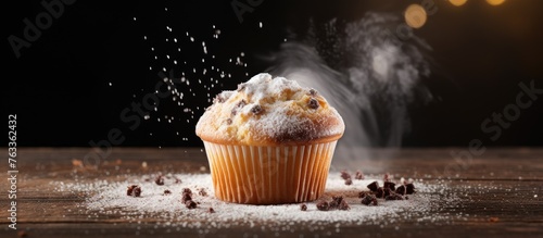 A muffin topped with powder...