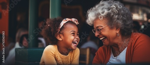 Two generations laughing joyfully together photo