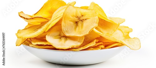 Bowl of yellow chips with b...