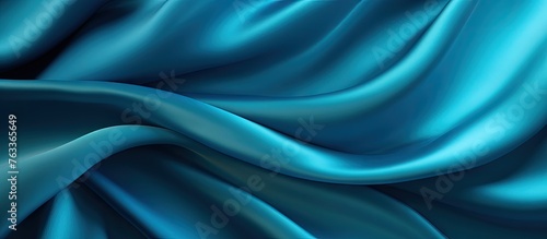 Smooth blue silk fabric close up