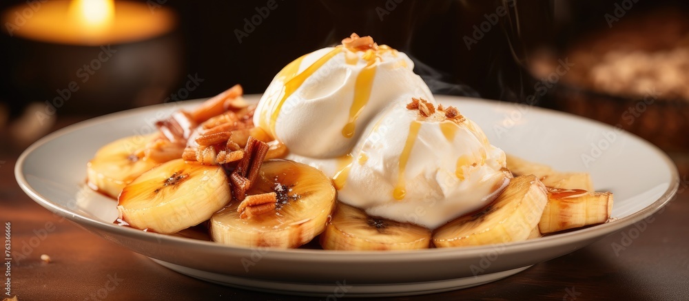 Bowl of bananas with ice cream and caramel sauce