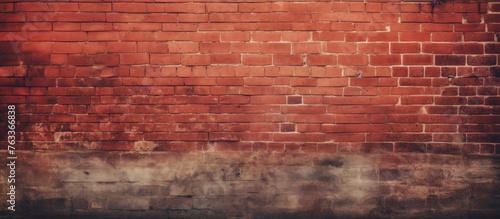 Grungy red brick wall and concrete floor