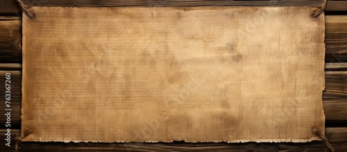Old paper on wooden wall
