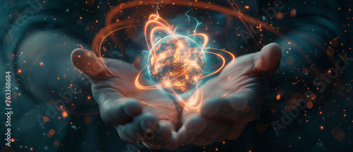 Cosmic background with radiant atom symbol in hands