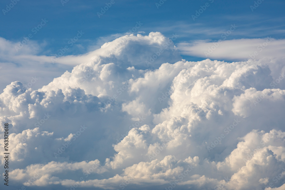 Large storm clouds forming on the horizon on a warm summer evening; Edmonton, Alberta, Canada Large storm clouds forming on the horizon on a warm summer evening; Edmonton, Alberta, Canada
