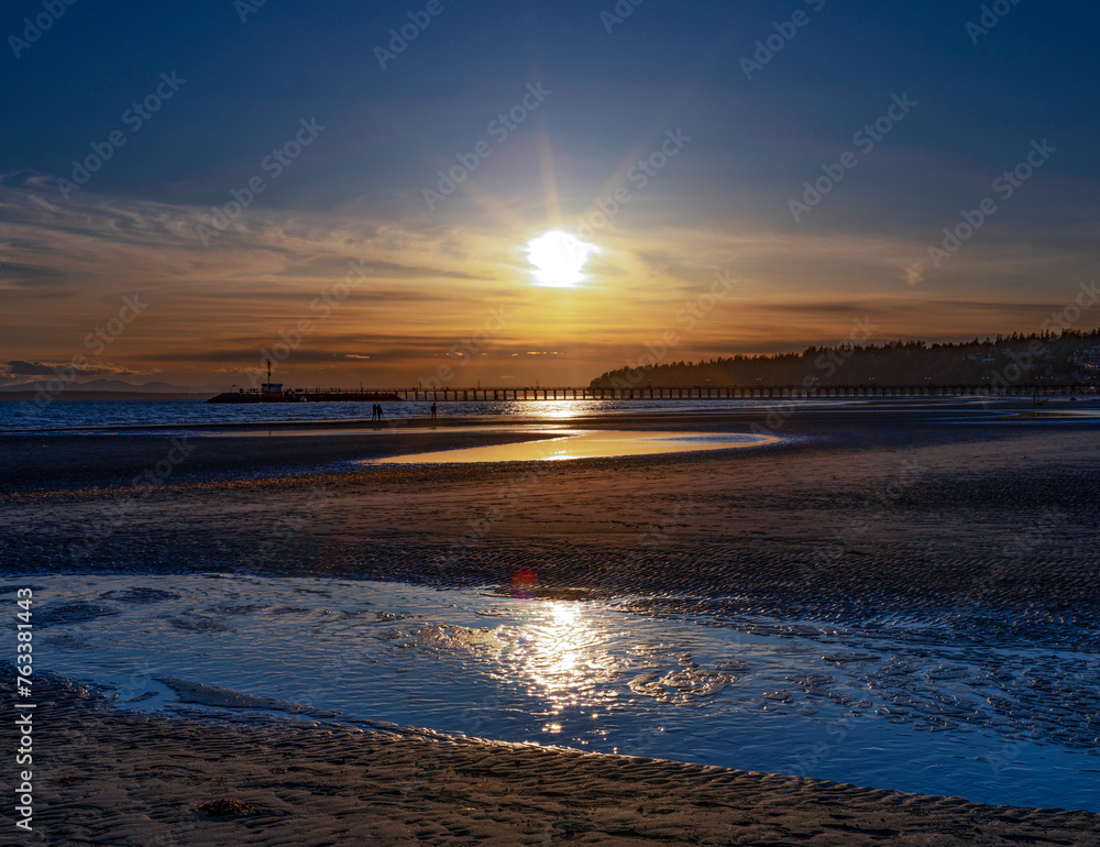 Beautiful sunset at the seaside of White Rock Beach; White Rock, British Columbia, Canada Beautiful sunset at the seaside of White Rock Beach; White Rock, British Columbia, Canada