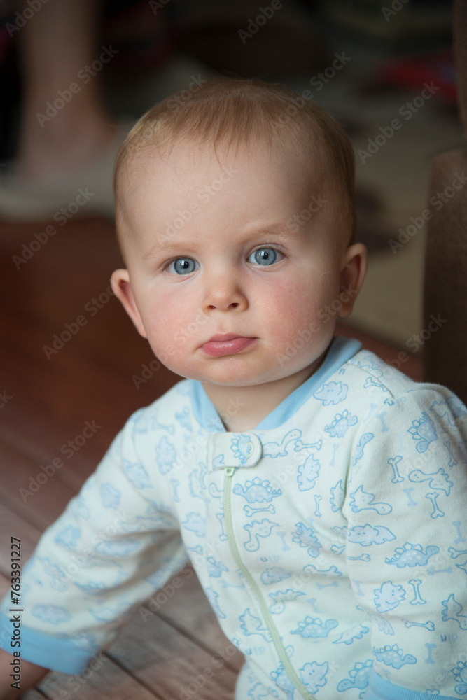 Portrait of a baby boy in a sleeper at home; San Diego, California, United States of America Portrait of a baby boy in a sleeper at home; San Diego, California, United States of America