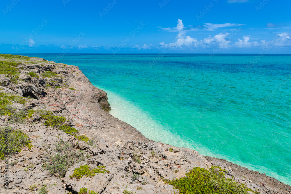 Beautiful turquoise Caribbean Sea and rocky shore at Playa Pilar Beach; Cayo Guillermo, Cuba Beautiful turquoise Caribbean Sea and rocky shore at Playa Pilar Beach; Cayo Guillermo, Cuba