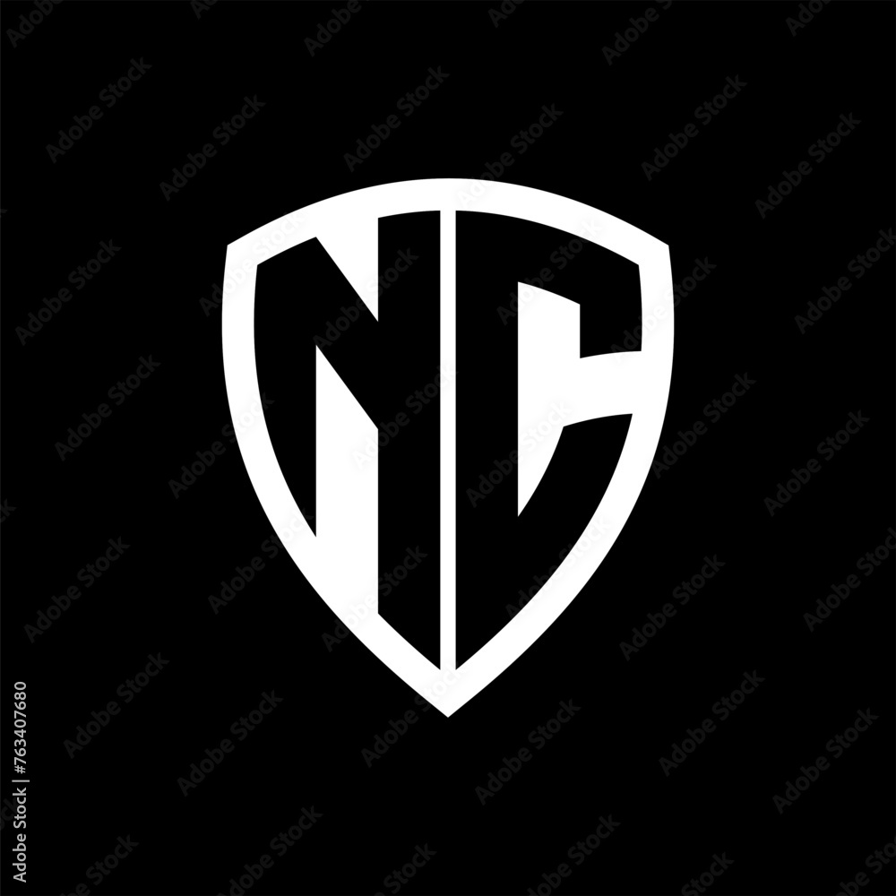 NC monogram logo with bold letters shield shape with black and white color design NC monogram logo with bold letters shield shape with black and white color design