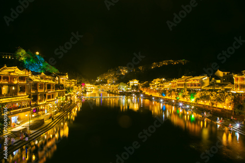 Fenghuang Ancient Town, Xiangxi Miao Autonomous Prefecture, Hunan Province - panoramic view of city scenery at night