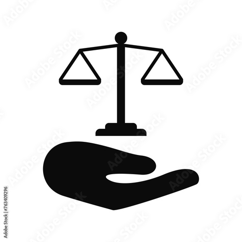 Scales of justice in hand silhouette icon, legal law vector cut silhouette for social media.
