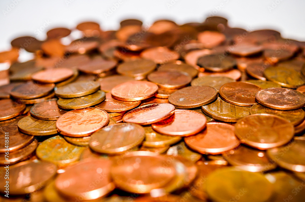 Multiple pennies piled together Multiple pennies piled together