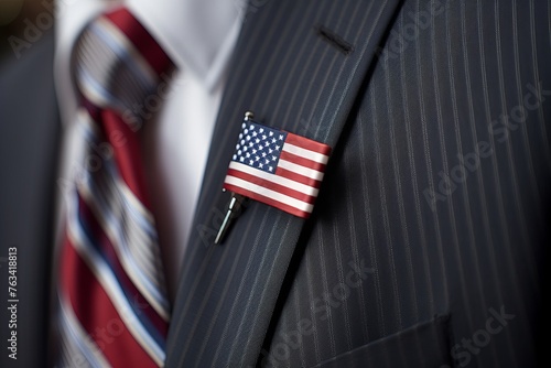A close up of an American flag pin on a lapel during a Patriot Day gathering