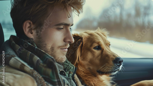 Joyful Drive: Young Man with Dog in the Backseat  © Creative Valley