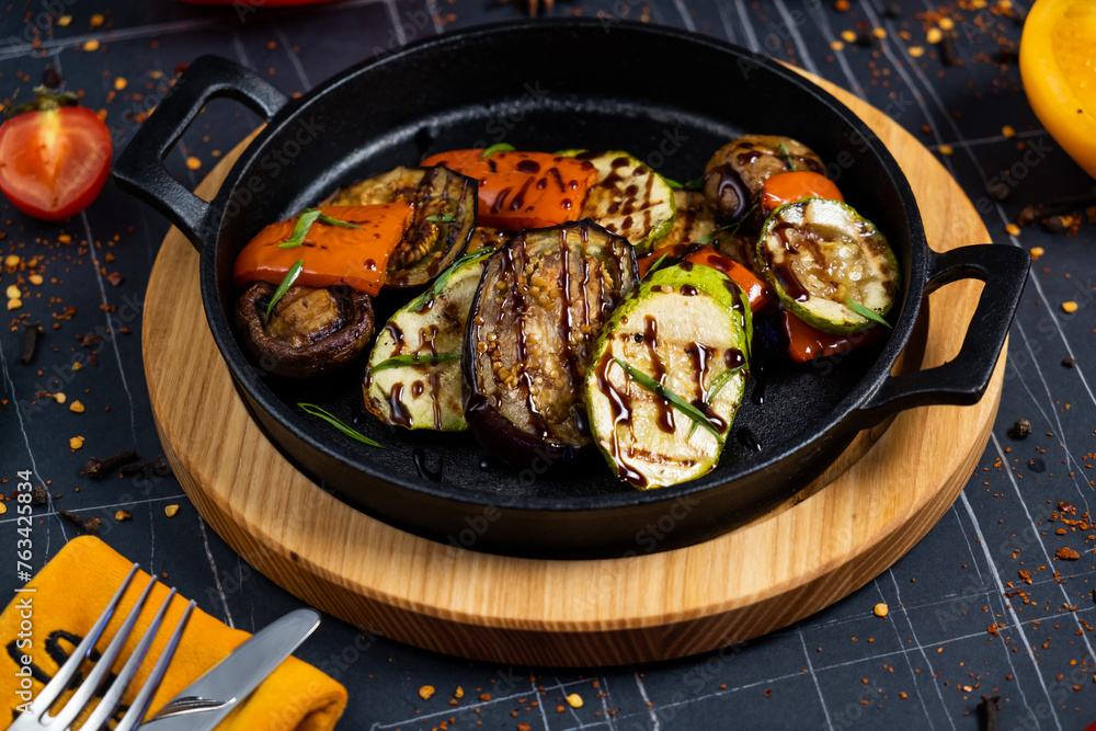 Grilled vegetables in a cast iron grilling pan, view from above Grilled vegetables in a cast iron grilling pan, view from above