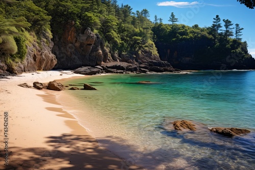 Secluded cove with crystal clear waters and sandy shores  a hidden natural gem