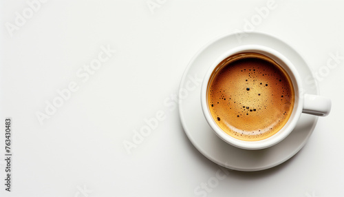 Hot cappuccino in coffee mug on white background