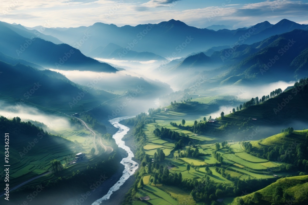 Misty morning over a tranquil mountain valley