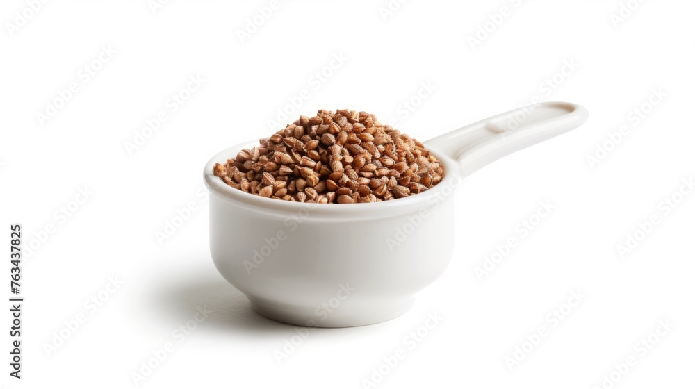 A small white bowl filled with brown buckwheat flakes, a gluten-free superfood rich in nutrients, perfect for vegan and vegetarian diets A small white bowl filled with brown buckwheat flakes, a gluten-free superfood rich in nutrients, perfect for vegan and vegetarian diets