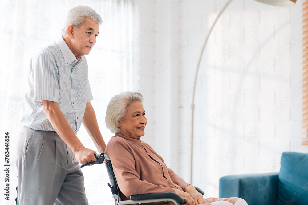 A happy elderly couple in retirement receives loving care and support from family and professional caregivers at home, ensuring health and smiles. A happy elderly couple in retirement receives loving care and support from family and professional caregivers at home, ensuring health and smiles.