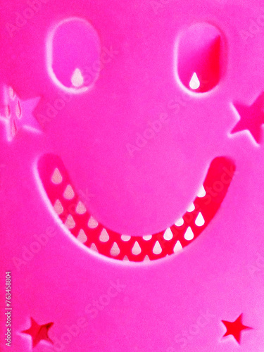 Pink smile as a symbol of good mood