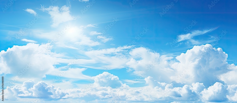 Beach scenery under clear sky with fluffy clouds Beach scenery under clear sky with fluffy clouds