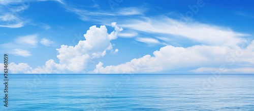 Calm ocean with cloud in sky © Ilgun