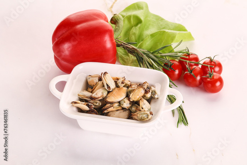 Marinated mussels in the bowl