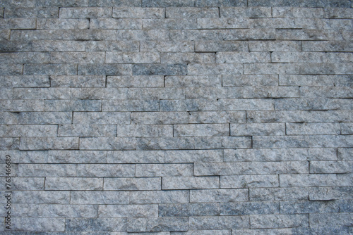 Grey stone brick wall background texture
