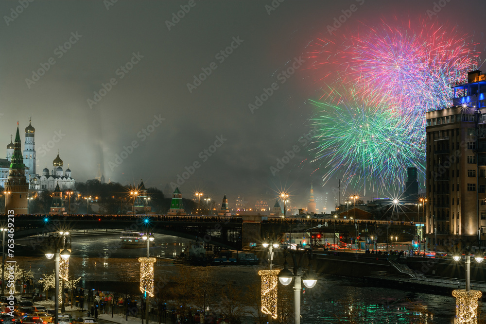 New Year fireworks over the river at night in Moscow