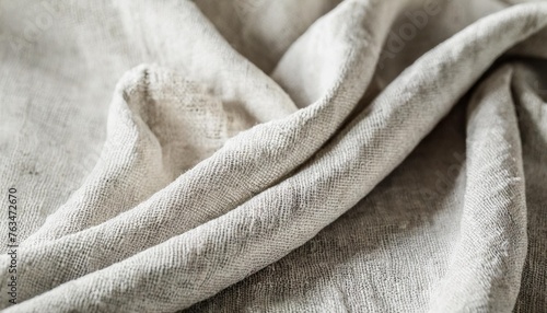 close up handmade natural cotton linen old fabric textile cloth in light white vintage retro color for abstract background