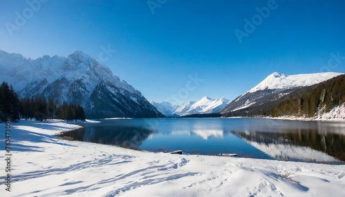 beautiful winter snowy scene landscape in the mountains with a lake snow wallpaper background