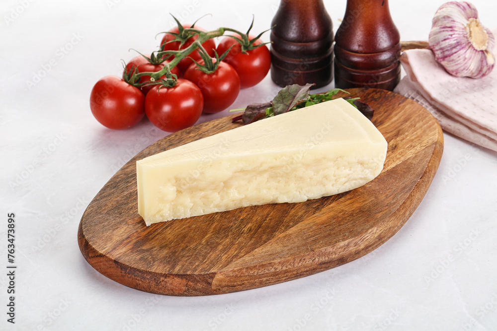 Piece Italian hard parmesan cheese