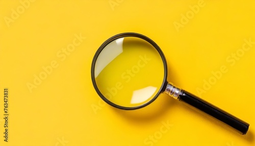 magnifying glass loupe search symbol on yellow background with copy space banner